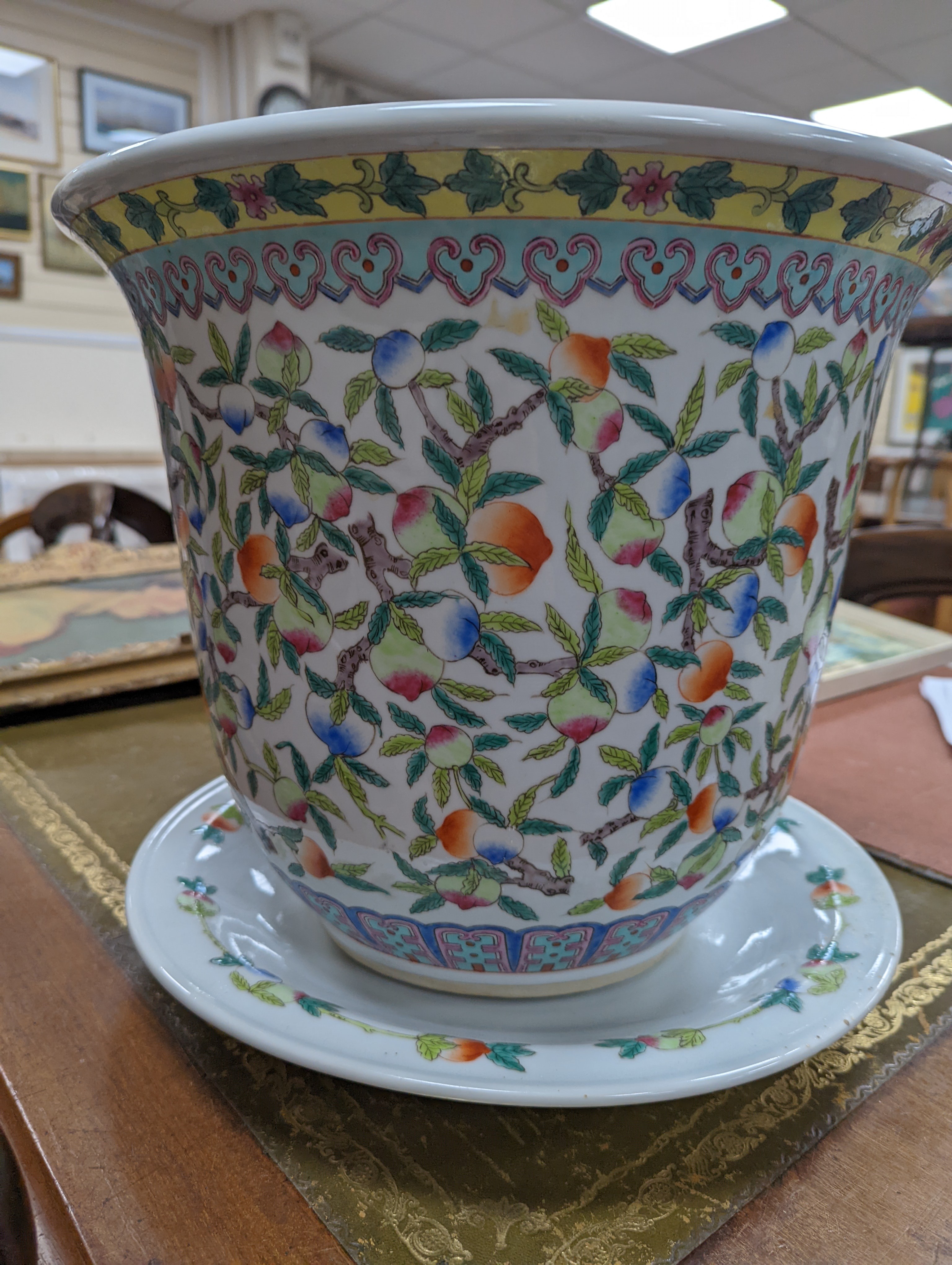 A 20th century Chinese porcelain jardiniere and dish, diameter 36 cms.
